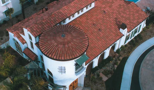 Picture of Marco Roofing showcases exceptional craftsmanship with a beautifully tiled roof on this elegant home. Known for consistently achieving a Highest in Quality rating, Marco Roofing ensures enduring protection and aesthetic appeal. Copyright ©2025 Diamond Certified Resource

 - Marco Roofing