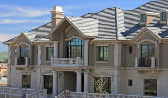 Picture of The grand facade of this elegant home showcases Marco Roofing's commitment to quality outcomes with its expertly installed roofing. An embodiment of refined architecture, the project highlights the company's high customer satisfaction ratings. Copyright ©2025 Diamond Certified Resource

 - Marco Roofing