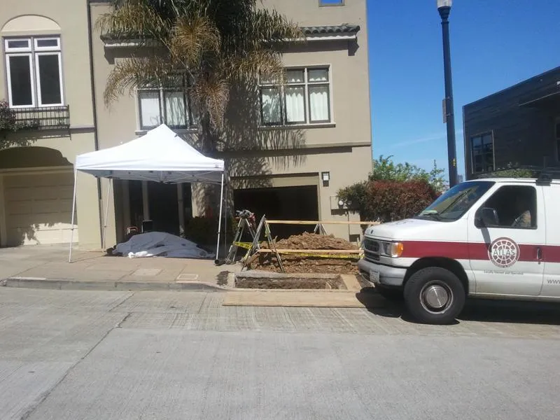 Picture of Under the shade of a white tent, a front yard is transformed amid cautious precision. Atlas Plumbing & Rooterâ€™s meticulous attention to detail reflects their high customer satisfaction ratings. Copyright ©2025 Diamond Certified Resource - Atlas Plumbing & Rooter