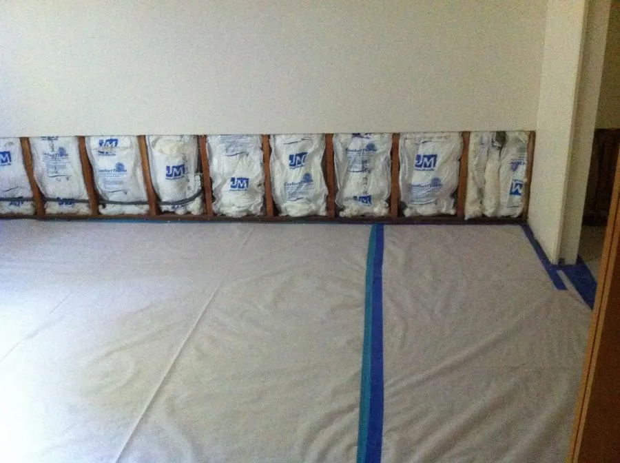 Picture of In a room prepared for restoration, NBE Property Restoration showcases its commitment to quality outcomes. The exposed insulation hints at careful planning and meticulous work. The company, recognized for expertise and quality, maintains high standards throughout its projects. Copyright ©2025 Diamond Certified Resource

 - NBE Property Restoration