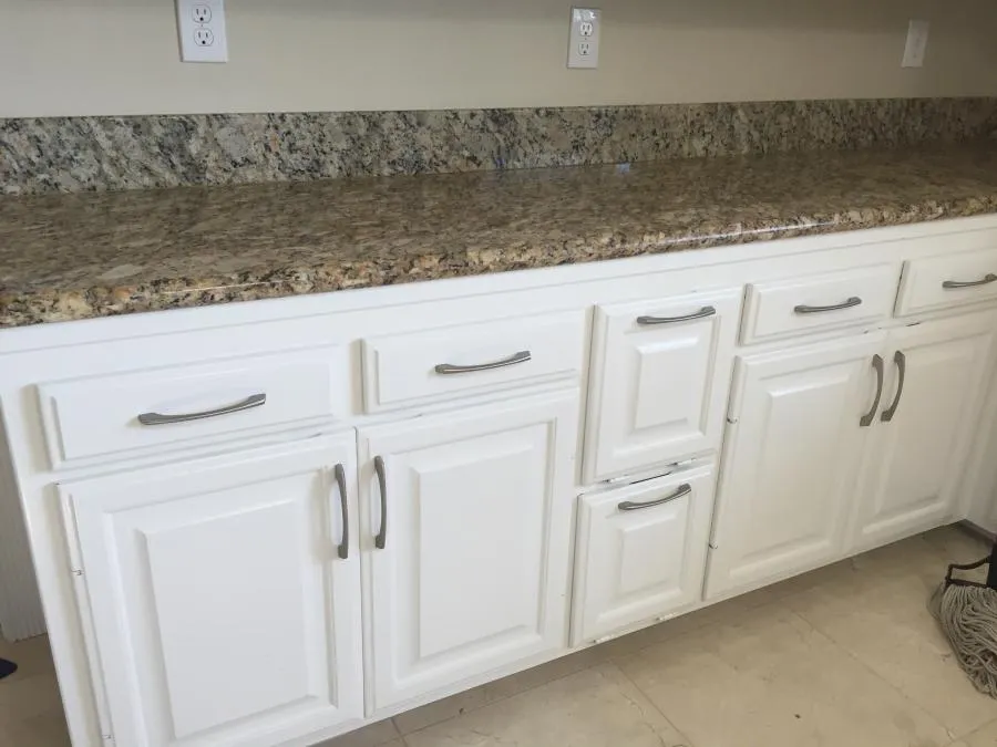 Picture of In a seamless blend of elegance and functionality, NBE Property Restoration delivers superior craftsmanship with this pristine white cabinetry installation, highlighting their focus on quality outcomes. Copyright ©2025 Diamond Certified Resource - NBE Property Restoration