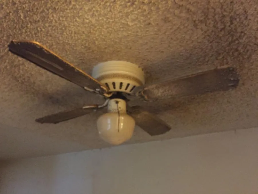 Picture of In a room marked by aging features, a ceiling fan stands as a quiet testament to NBE Property Restoration's commitment to revitalizing spaces. Recognized for expertise and quality, the company transforms such aged elements into renewed brilliance. Copyright ©2025 Diamond Certified Resource

 - NBE Property Restoration