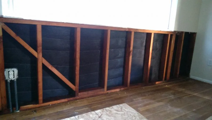 Picture of A partially exposed wall reveals NBE Property Restoration's dedication to quality outcomes. The careful removal showcases their expertise in handling structural repairs efficiently. The company, recognized for expertise and quality, ensures precise workmanship. Copyright ©2025 Diamond Certified Resource

 - NBE Property Restoration