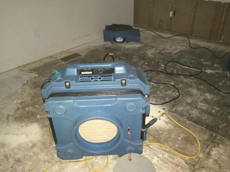 Picture of Amidst the remnants of a restoration project, a HEPA 500 unit stands ready, symbolizing NBE Property Restoration's commitment to quality outcomes. With high customer satisfaction ratings, the company ensures every detail is expertly managed. Copyright ©2025 Diamond Certified Resource

 - NBE Property Restoration