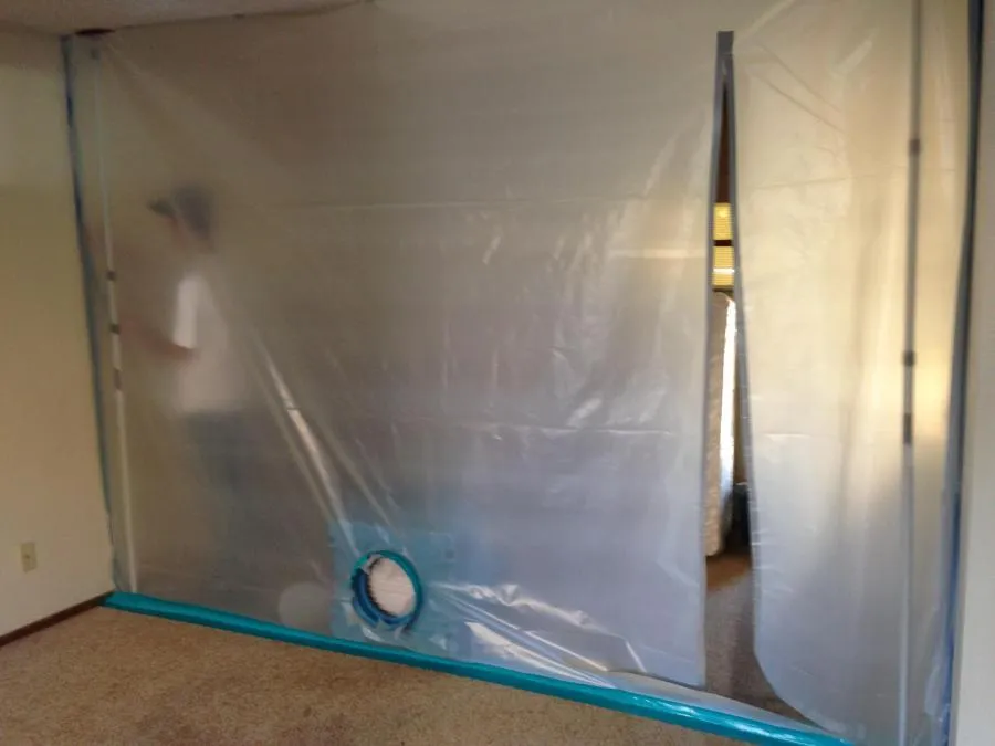 Picture of A delicate barrier of plastic sheeting creates a makeshift room, hinting at the careful restoration work being undertaken by NBE Property Restoration. Known for consistently achieving a Highest in Quality rating, the company ensures every project is meticulously handled to protect the surrounding environment. Copyright ©2025 Diamond Certified Resource

 - NBE Property Restoration