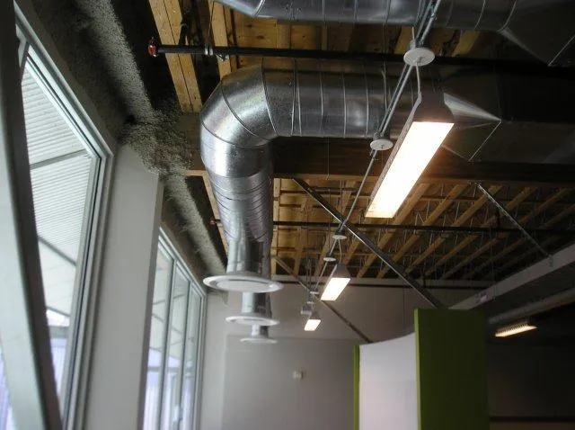 Picture of  Sunlight filters through expansive windows as a meticulously installed ductwork system by Innovative Mechanical, Inc. ensures optimal air circulation, reflecting their focus on quality outcomes. Copyright ©2025 Diamond Certified Resource.

 - Innovative Mechanical, Inc.