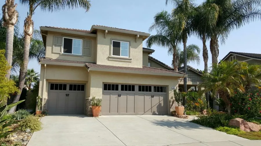 Picture of A serene suburban home showcases the exceptional craftsmanship of R & P Garage Doors, where quality outcomes are a steadfast focus. The elegant dual garage doors complement the home's architecture with understated sophistication. R & P Garage Doors has earned Diamond Certified recognition. Copyright ©2025 Diamond Certified Resource

 - R & P Garage Doors