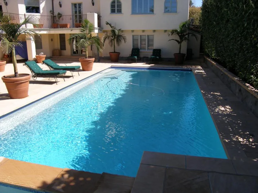 Picture of The serene glisten of a pristine pool hints at a day of relaxation by Classic Pools. The careful arrangement of loungers and potted palms creates a tranquil retreat, reflecting the companyâ€™s focus on quality outcomes. Classic Pools is recognized for expertise and quality. Copyright ©2025 Diamond Certified Resource

 - Classic Pools