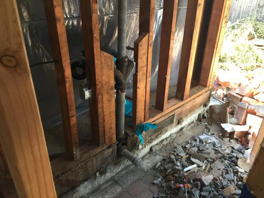 Picture of Amid a backdrop of exposed wooden beams and disrupted flooring, Redwood Empire Termite & Pest Control prepares for a critical intervention, reflecting their focus on quality outcomes. Copyright ©2025 Diamond Certified Resource - Redwood Empire Termite & Pest Control