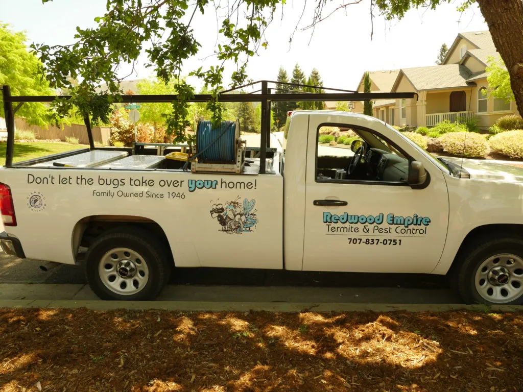 Picture of In the serene shade of a leafy neighborhood, a Redwood Empire Termite & Pest Control truck stands ready, embodying the company's focus on quality outcomes. The image captures the quiet preparedness that ensures customer satisfaction. Copyright ©2025 Diamond Certified Resource

 - Redwood Empire Termite & Pest Control