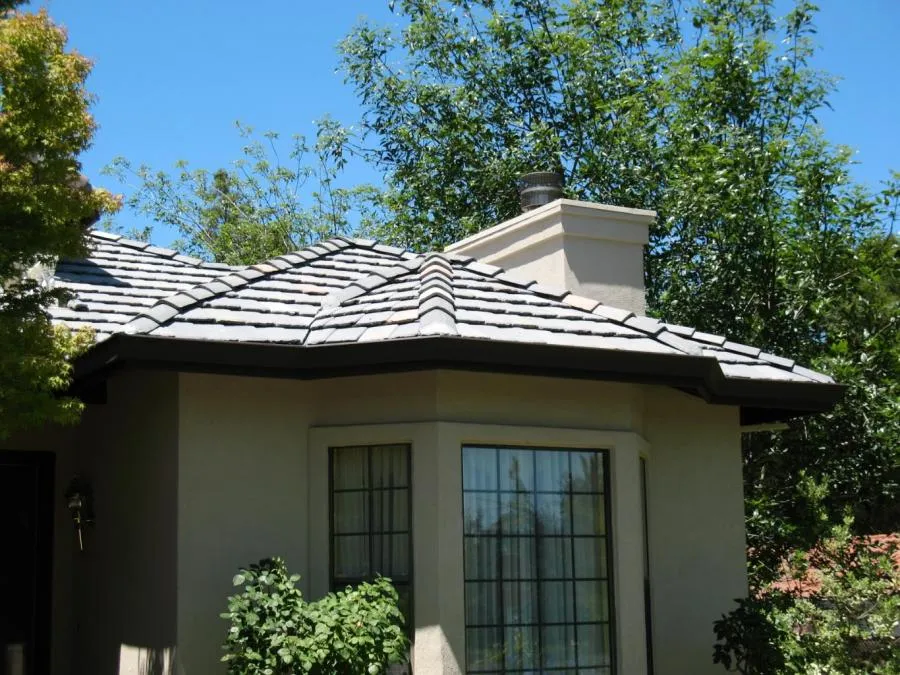 Picture of The clean lines of a beautifully installed roof reflect Los Gatos Roofingâ€™s commitment to quality outcomes. Surrounded by lush greenery, this home stands as a testament to the company's expertise. Copyright ©2025 Diamond Certified Resource

 - Los Gatos Roofing