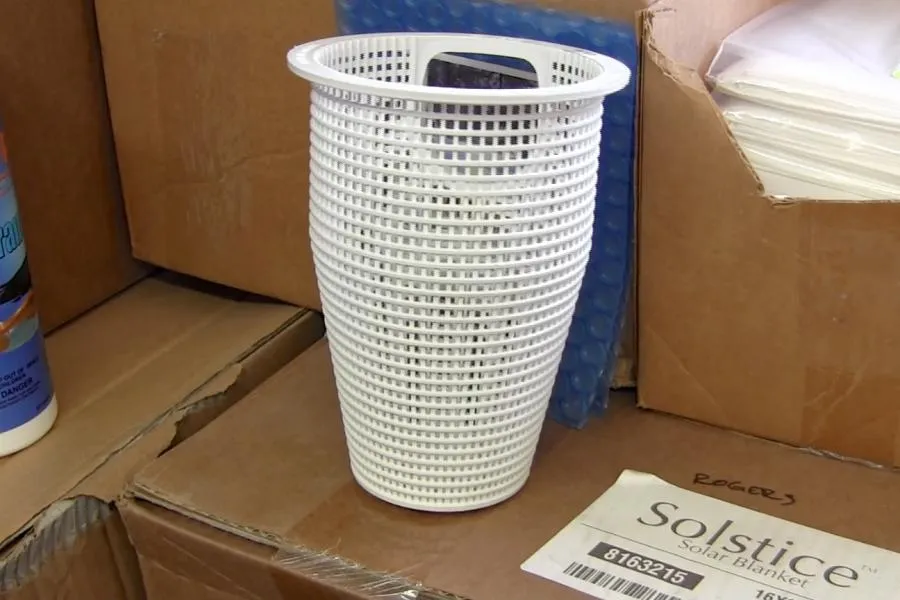 Picture of Among the tools of Roger's Pool & Spa Service Inc., a pristine pool skimmer basket hints at their commitment to quality outcomes. They focus on the finer details to ensure customer satisfaction. Copyright ©2025 Diamond Certified Resource - Roger's Pool & Spa Service Inc.