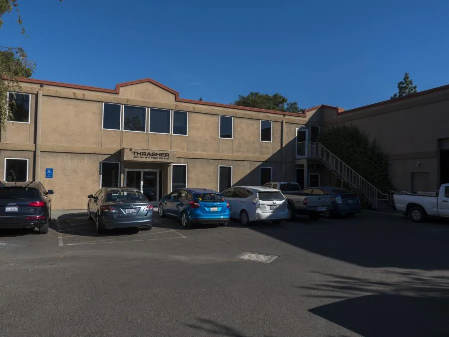 Picture of A quiet parking lot outside Thrasher Termite & Pest Control, Inc. reflects the precision and care with which they handle every job. Known for consistently achieving a Highest in Quality rating, the company’s commitment to excellence is evident in every detail. Copyright ©2025 Diamond Certified Resource. - Thrasher Termite & Pest Control, Inc.