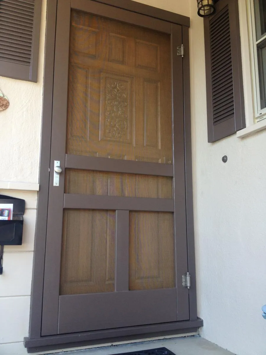 Picture of A meticulously crafted screen door stands as a testament to Wesco Screen Company Inc.'s focus on quality outcomes. As sunlight filters through the mesh, the door blends utility with elegance, embodying the company's dedication to high customer satisfaction ratings. Copyright ©2025 Diamond Certified Resource - Wesco Screen Company Inc.