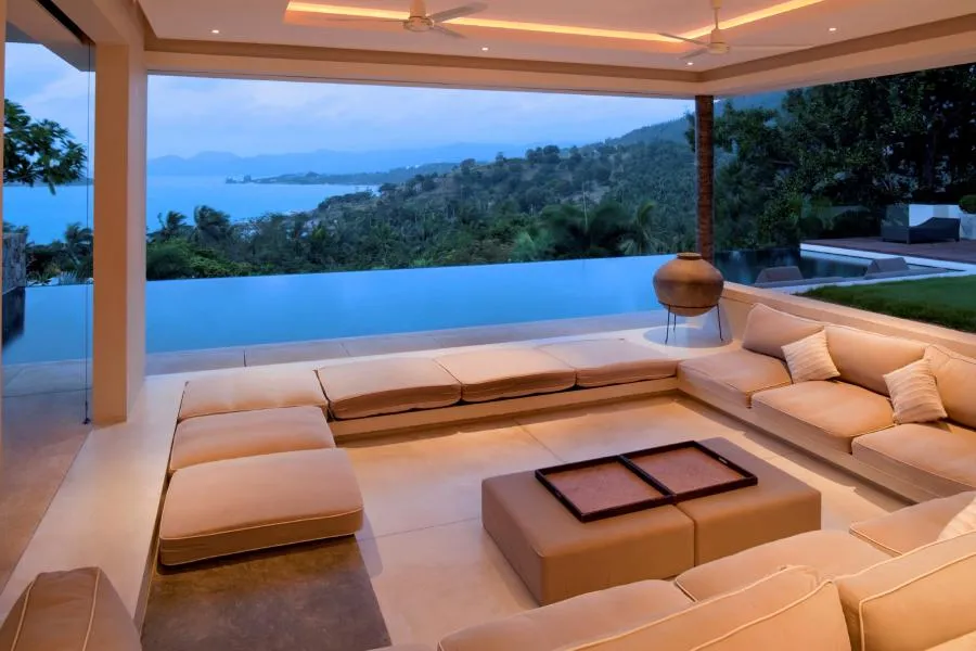 Picture of Amidst an idyllic setting, a luxurious seating area overlooks a serene infinity pool and lush landscape, illustrating Wesco Screen Company Inc.'s commitment to quality outcomes. Copyright ©2025 Diamond Certified Resource

 - Wesco Screen Company Inc.