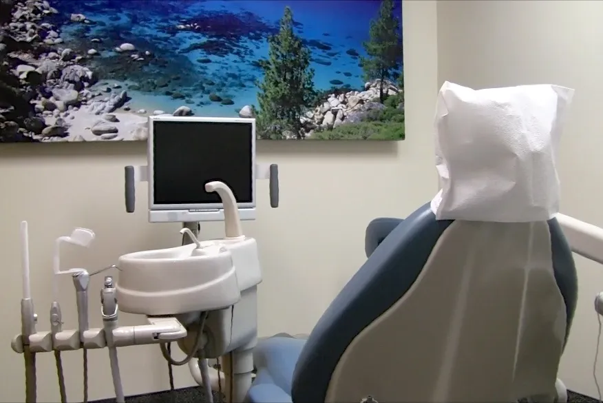 Picture of In the tranquil setting of William M. Schneider, D.D.S., a dental chair awaits the next patient, embodying the companyâ€™s focus on quality outcomes. This peaceful environment hints at the precision and care given to each appointment. Copyright ©2025 Diamond Certified Resource

 - William M. Schneider, D.D.S.