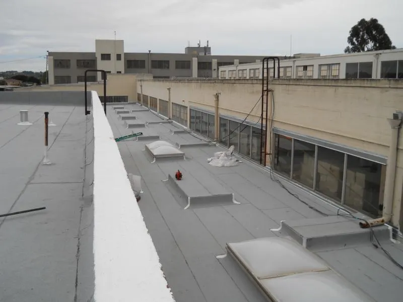 Picture of  On a calm, overcast day, the meticulous work by Ben's Roofing, Inc. is showcased on this expansive flat rooftop, highlighting their commitment to quality outcomes. Their expertise in achieving sturdy, weather-resistant surfaces underlines why they consistently achieve a Highest in Quality rating. Copyright ©2025 Diamond Certified Resource.

 - Ben's Roofing, Inc.
