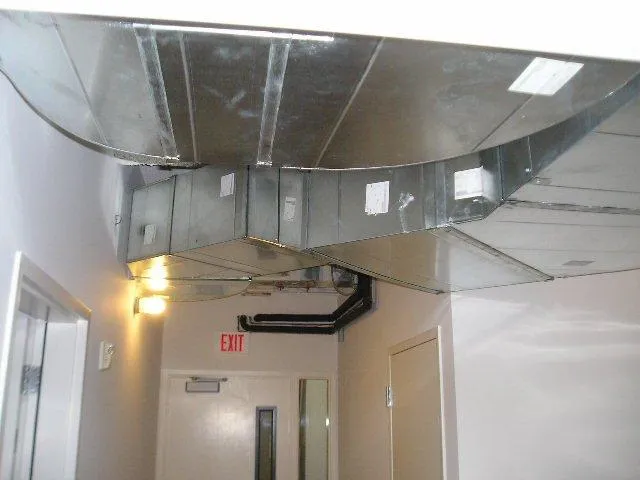 Picture of In a quiet corridor, innovative ductwork by Innovative Mechanical, Inc. showcases their commitment to quality outcomes. The precise alignment reflects the company’s top-rated quality. Copyright ©2025 Diamond Certified Resource. - Innovative Mechanical, Inc.