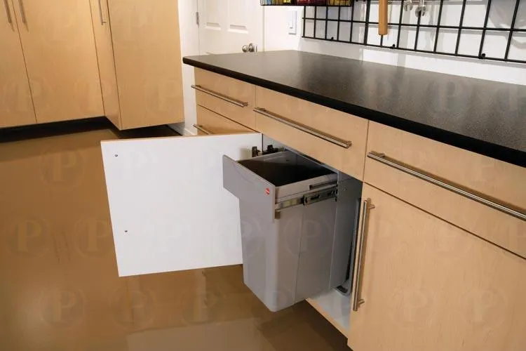Picture of PremierGarage reveals the elegance of organization with a seamlessly integrated pull-out trash bin, reflecting their focus on quality outcomes in every detail. Copyright ©2025 Diamond Certified Resource - PremierGarage