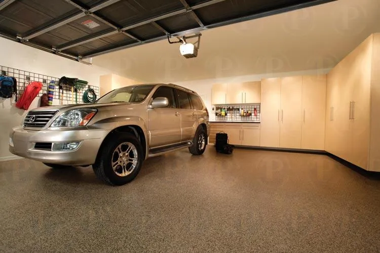 Picture of In a pristine garage, a sleek SUV stands beside custom cabinets, embodying PremierGarage's commitment to quality outcomes. The organized space reflects the company's high customer satisfaction ratings. Copyright ©2025 Diamond Certified Resource - PremierGarage
