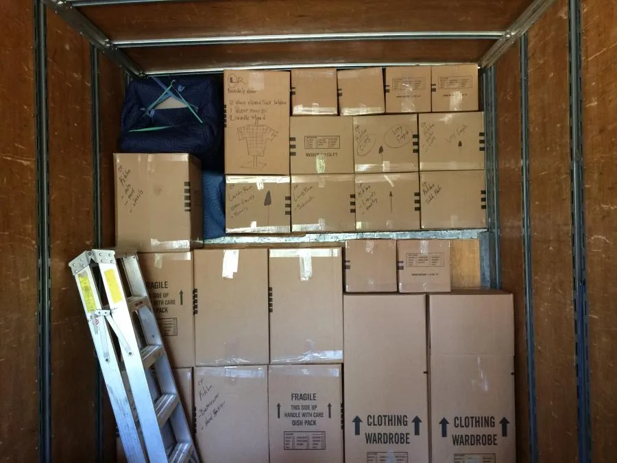 Picture of  Advantage Moving & Storage expertly stacks labeled boxes in a moving truck, showcasing their focus on quality outcomes through meticulous organization. The company's commitment to high customer satisfaction is evident. Copyright ©2025 Diamond Certified Resource.

 - Advantage Moving & Storage