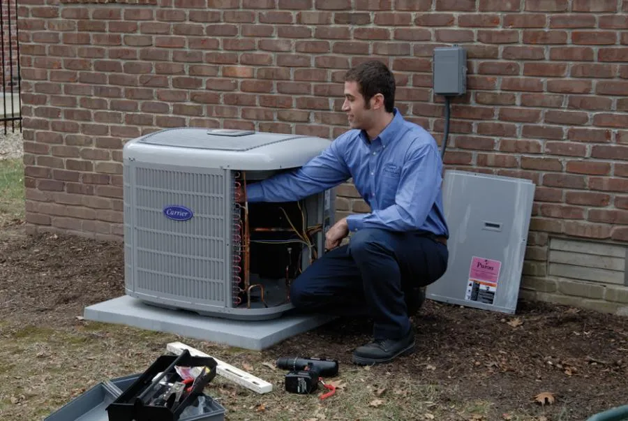 Picture of A technician from Degree HVAC, Inc. meticulously inspects an outdoor air conditioning unit, ensuring optimal performance. This dedication to quality outcomes reflects the companyâ€™s highest customer satisfaction ratings. Copyright ©2025 Diamond Certified Resource

 - Degree HVAC, Inc.