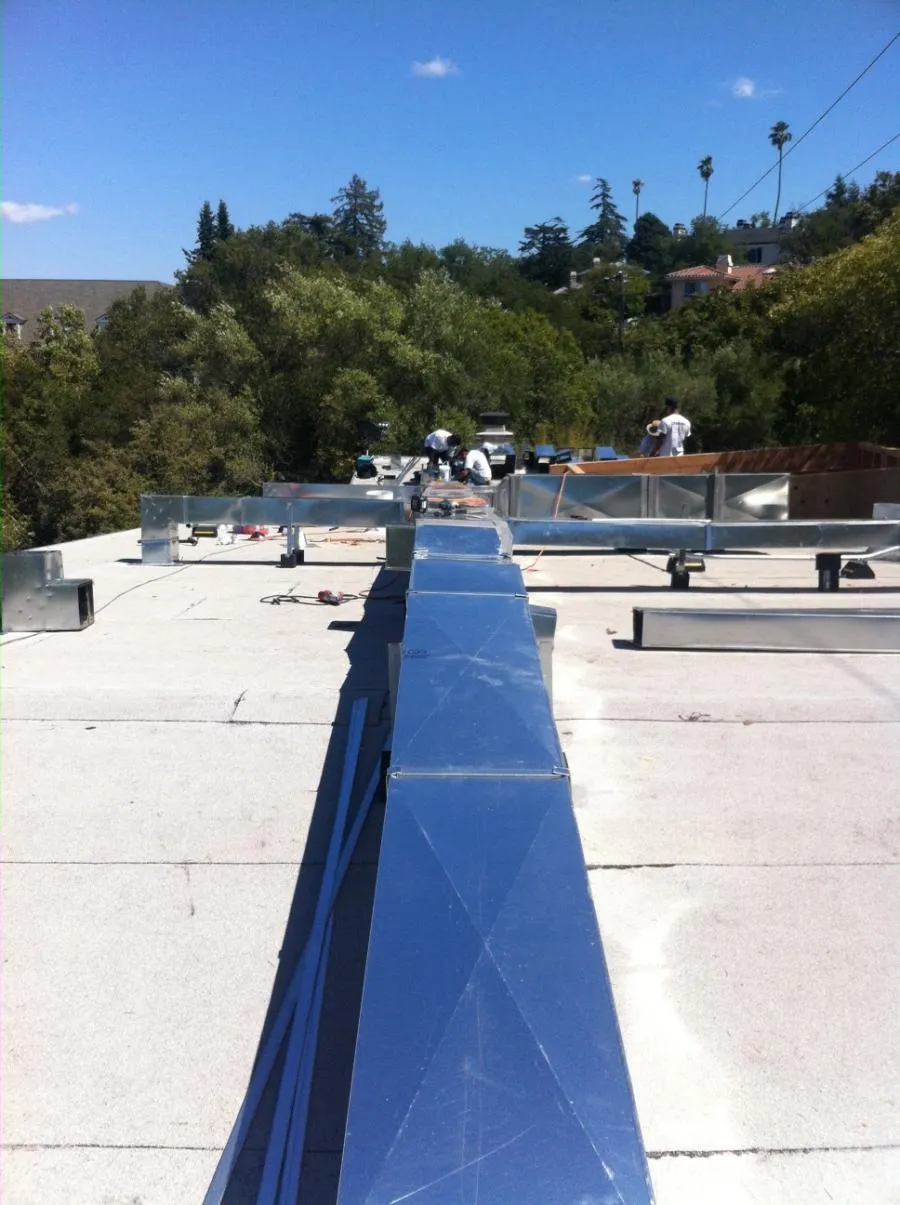 Picture of On a sunlit rooftop, a gleaming network of HVAC ducts is expertly installed by Degree HVAC, Inc., reflecting their recognized expertise and quality focus. Copyright ©2025 Diamond Certified Resource - Degree HVAC, Inc.