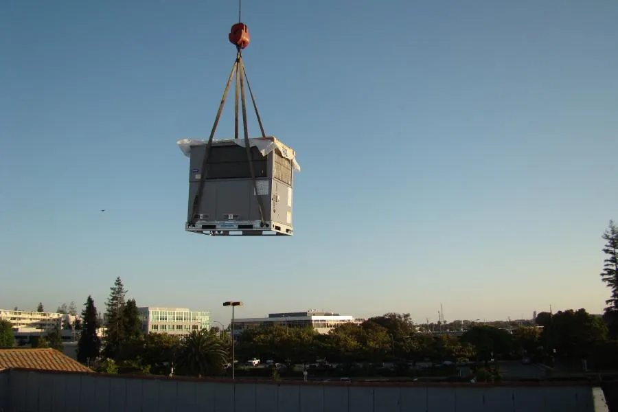 Picture of In the quiet embrace of dawn, Degree HVAC, Inc. expertly maneuvers a heavy unit high above the cityscape, a testament to their precision and skill. The company consistently achieves a Highest in Quality rating, ensuring their installations reflect the same excellence. Copyright ©2025 Diamond Certified Resource

 - Degree HVAC, Inc.