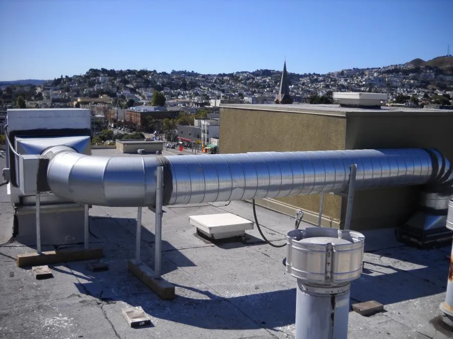 Picture of On a rooftop with a panoramic city view, an expertly installed HVAC duct system exemplifies Degree HVAC, Inc.'s commitment to quality outcomes and high customer satisfaction. Copyright ©2025 Diamond Certified Resource

 - Degree HVAC, Inc.
