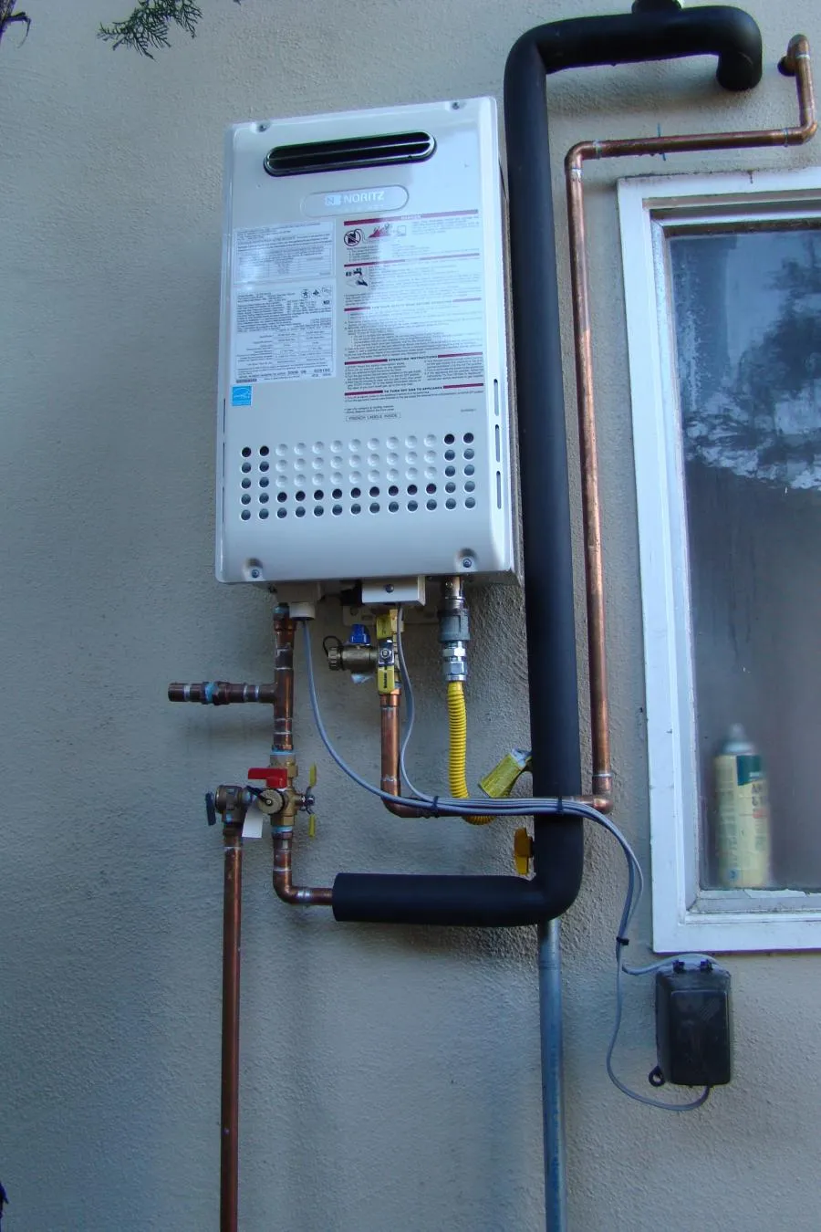 Picture of A meticulously installed tankless water heater is showcased by Degree HVAC, Inc., highlighting their dedication to quality outcomes and expertise in the field. This installation illustrates their consistent achievement in earning the highest quality ratings. Copyright ©2025 Diamond Certified Resource

 - Degree HVAC, Inc.