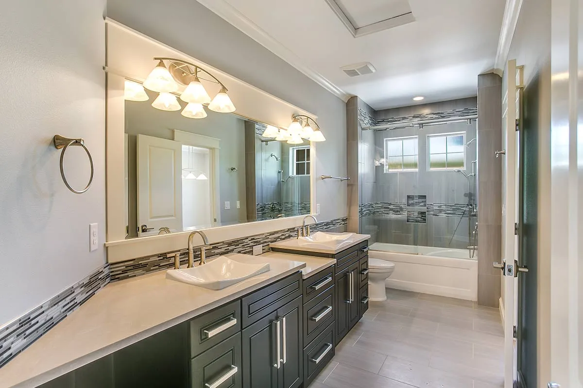Picture of In a space where sleek lines and modern finishes converge, Today's Kitchen & Bath demonstrates their commitment to quality outcomes through this sophisticated bathroom remodel. Copyright ©2025 Diamond Certified Resource

 - Today's Kitchen & Bath