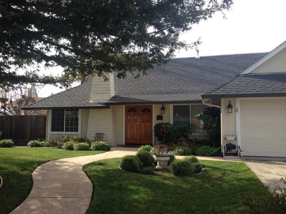 Picture of The charming front yard of a house showcases Bay Valley Roofing's meticulous work, with a perfectly fitted roof that enhances curb appeal. Recognized for expertise and quality, the companyâ€™s roofing solutions reflect its commitment to excellence. Copyright ©2025 Diamond Certified Resource

 - Bay Valley Roofing