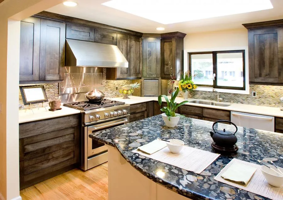 Picture of In this elegantly remodeled kitchen, the interplay of natural light and richly textured surfaces creates a seamless blend of warmth and functionality. Next Stage Design + Build's focus on quality outcomes is evident in every detail. Copyright ©2025 Diamond Certified Resource

 - Next Stage Design + Build