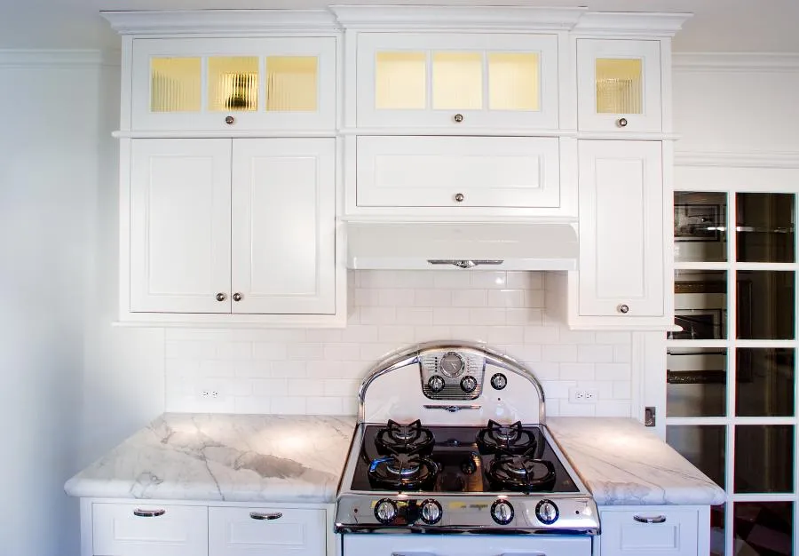 Picture of In this elegantly redesigned kitchen, the gleaming stovetop and pristine cabinetry exemplify Next Stage Design + Build's commitment to quality outcomes. Known for their expertise, the company consistently achieves high customer satisfaction ratings. Copyright ©2025 Diamond Certified Resource

 - Next Stage Design + Build
