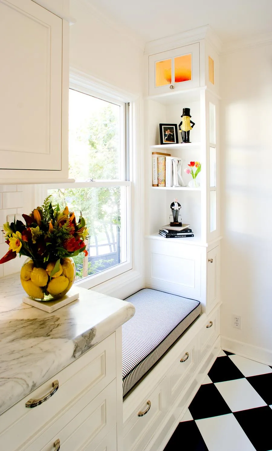 Picture of A quiet corner celebrates thoughtful design at its best with the integration of decorative shelving and a cozy window seat. Next Stage Design + Build focuses on quality outcomes in every project. Copyright ©2025 Diamond Certified Resource

 - Next Stage Design + Build