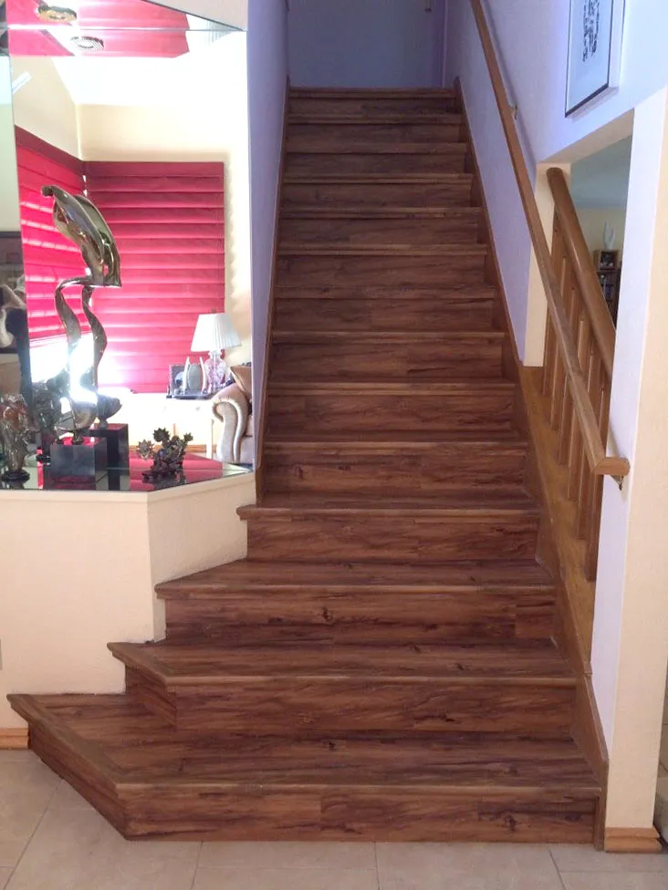 Picture of The elegant wooden staircase, a hallmark of Abbey Carpets by Fashion Floors, showcases the companyâ€™s commitment to quality outcomes. Every detail reflects their high customer satisfaction ratings. Copyright ©2025 Diamond Certified Resource - Abbey Carpets by Fashion Floors