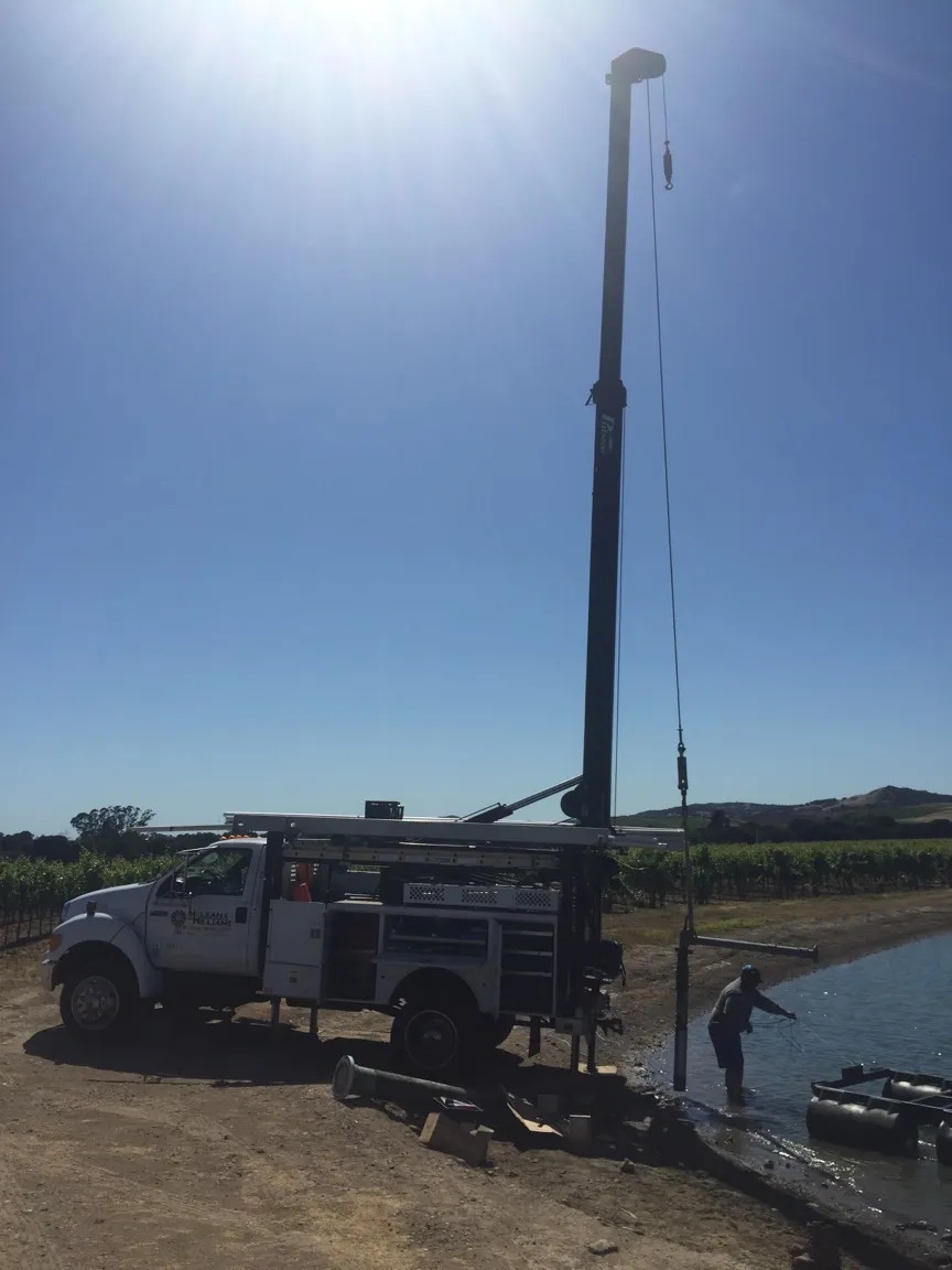 Picture of Under the bright sun, McLean & Williams, Inc. performs a meticulous water-side operation, embodying their focus on quality outcomes. The scene encapsulates their high customer satisfaction as they deliver precise, expert services. Copyright ©2025 Diamond Certified Resource

 - McLean & Williams, Inc.