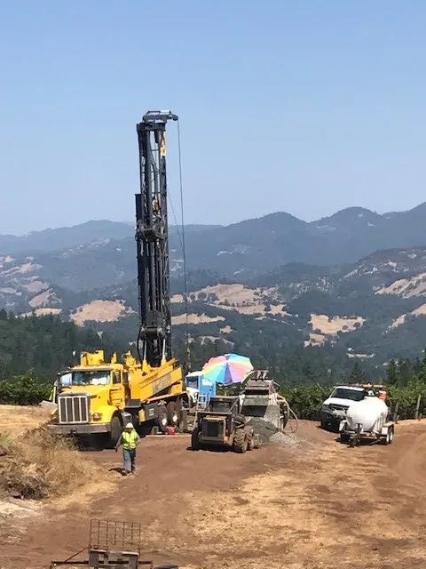Picture of Amidst the serene backdrop of rolling hills, McLean & Williams, Inc. deftly orchestrates a complex drilling operation, demonstrating why they consistently achieve the Highest in Quality rating. Copyright ©2025 Diamond Certified Resource - McLean & Williams, Inc.