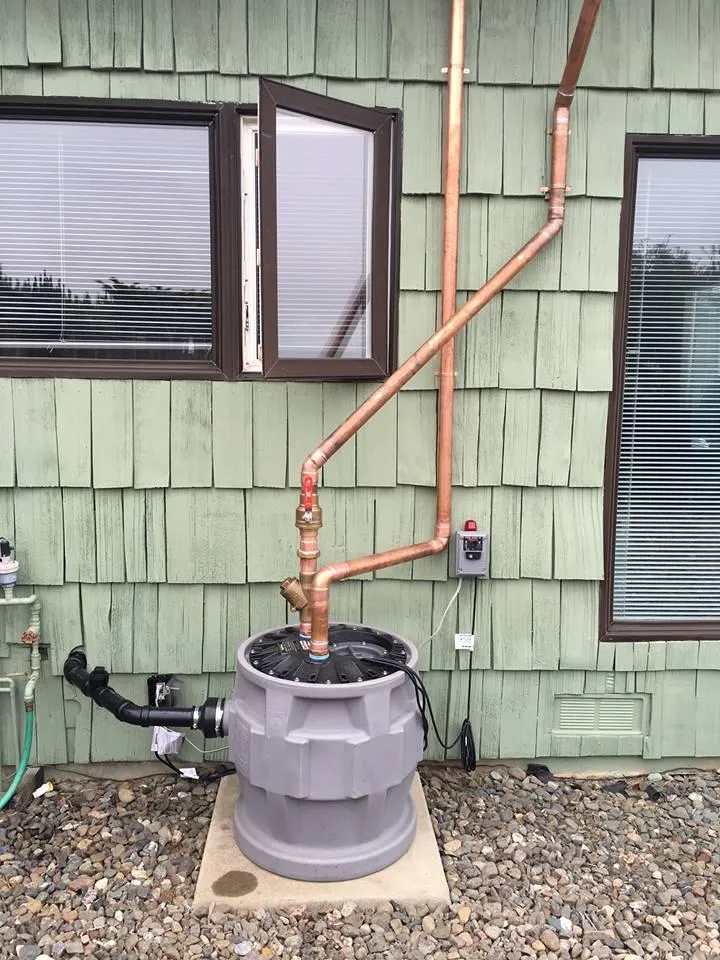 Picture of Ongaro & Sons showcases their commitment to quality with an expertly installed sump pump system, illustrating their focus on quality outcomes. An emblem of reliability against a backdrop of green siding. Copyright ©2025 Diamond Certified Resource

 - Ongaro & Sons