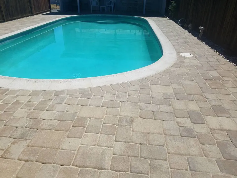 Picture of The Legacy Paver Group showcases its commitment to quality with a meticulously laid paver pool deck, blending aesthetics with functionality. Recognized for expertise and quality, each stone tells a story of precision and care. Copyright ©2025 Diamond Certified Resource

 - The Legacy Paver Group