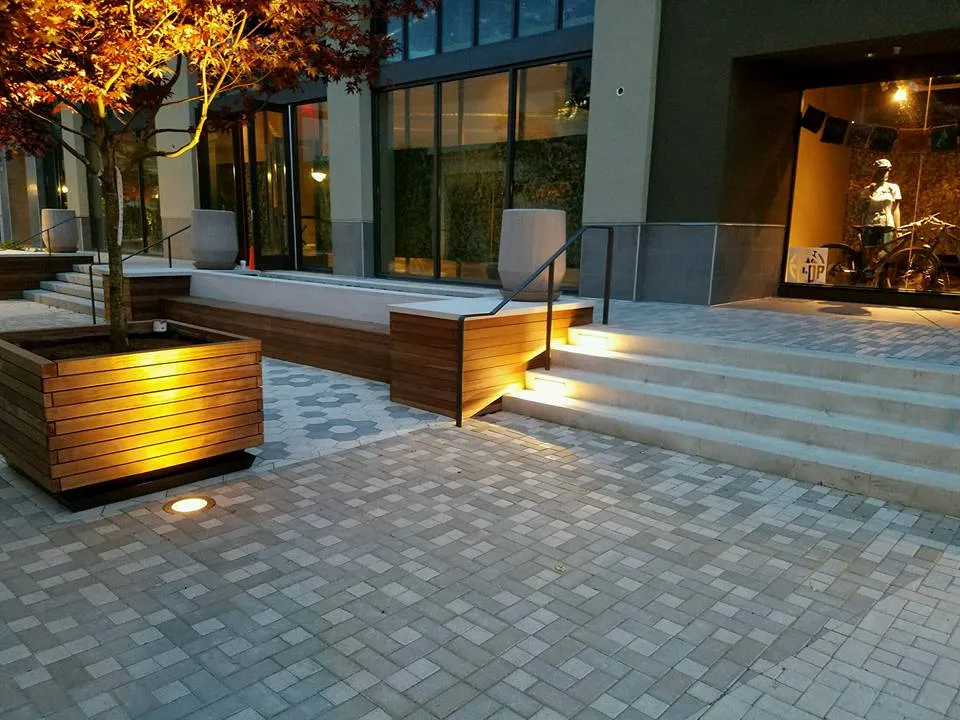 Picture of Subtle lighting bathes the precisely arranged pavers, highlighting The Legacy Paver Group's commitment to quality outcomes. This harmonious design reflects their expertise and highest quality rating. Copyright ©2025 Diamond Certified Resource

 - The Legacy Paver Group