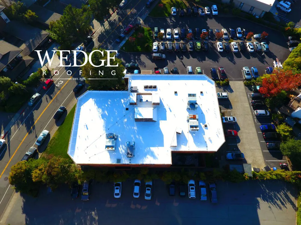 Picture of A pristine white rooftop stands out amid a bustling urban setting, reflecting Wedge Roofing's commitment to quality outcomes. Their expert craftsmanship has earned them Diamond Certification. Copyright ©2025 Diamond Certified Resource

 - Wedge Roofing
