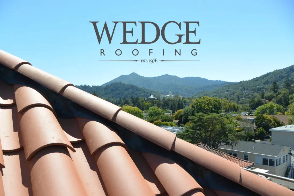 Picture of Against the backdrop of serene mountains, a pristine terracotta roof showcases Wedge Roofing's commitment to quality outcomes. Recognized for expertise and quality, the company transforms landscapes with enduring craftsmanship. Copyright ©2025 Diamond Certified Resource

 - Wedge Roofing