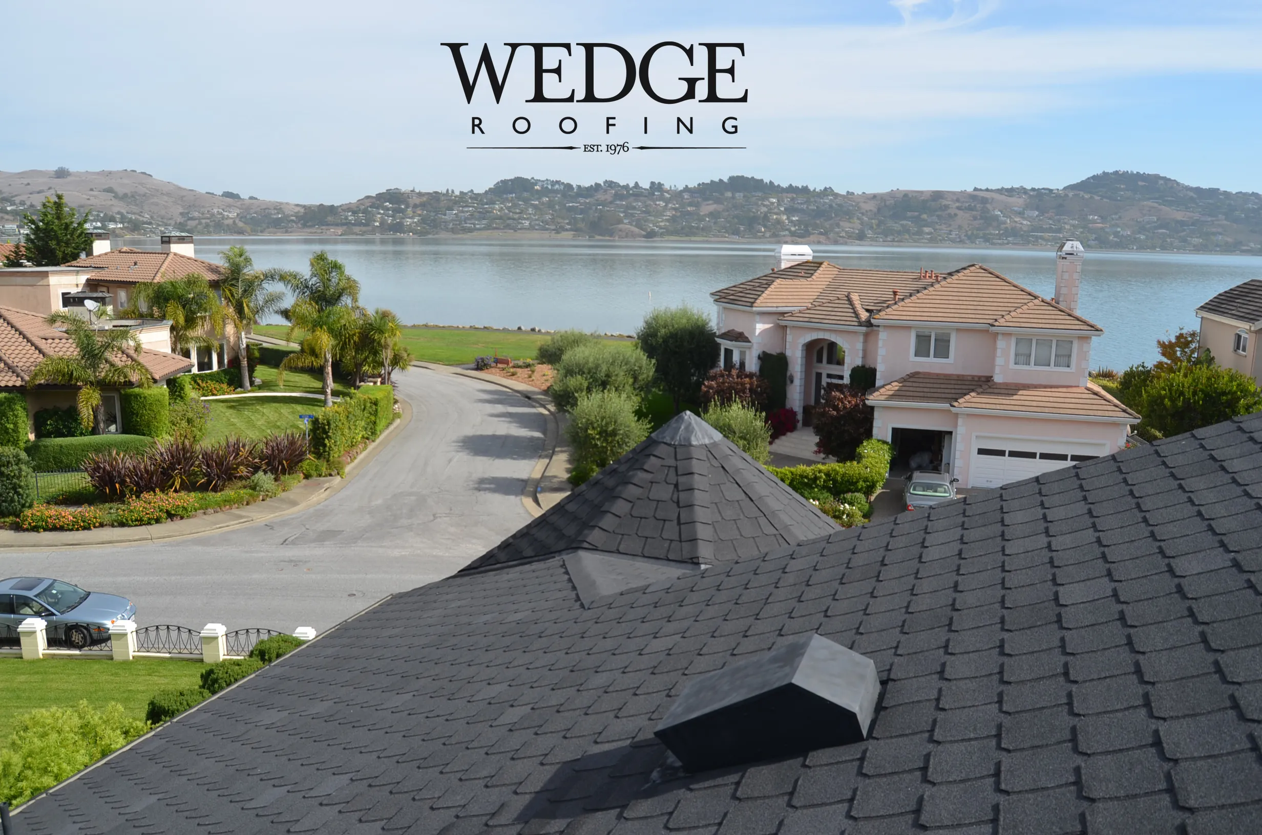 Picture of Perched above serene waters, this pristine rooftop showcases Wedge Roofing's commitment to quality outcomes. The expertly crafted roof reflects the companyâ€™s earned Diamond Certified status. Copyright ©2025 Diamond Certified Resource

 - Wedge Roofing