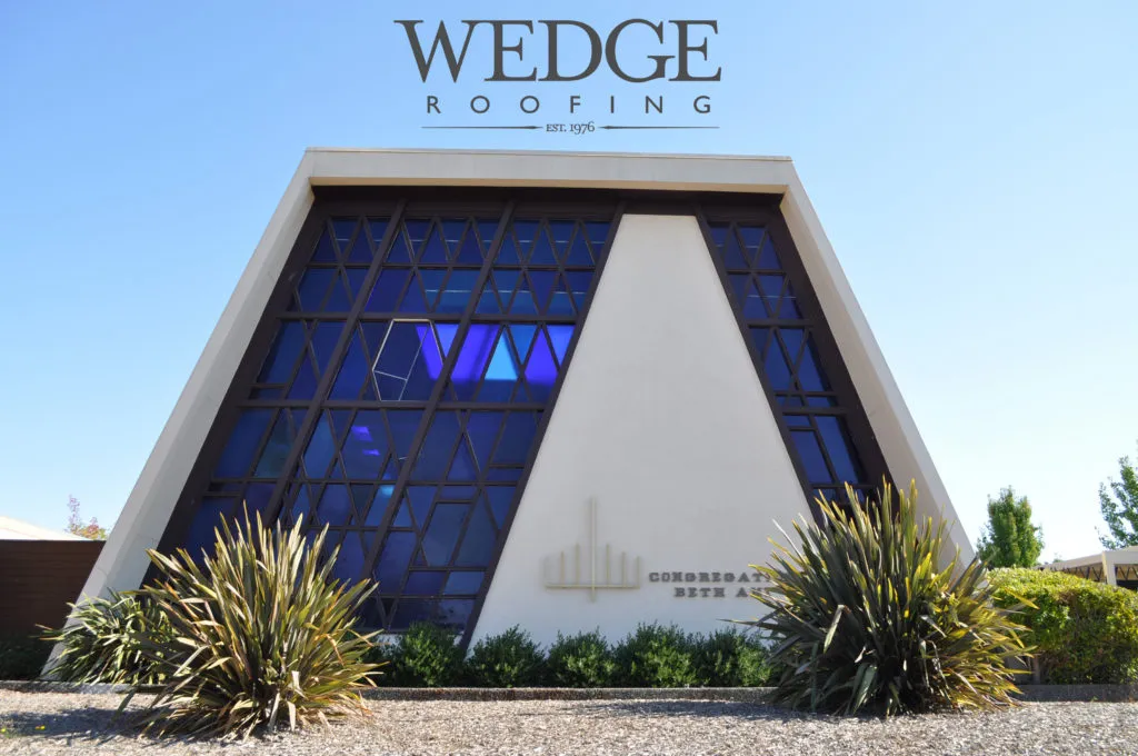 Picture of The striking triangular architecture of the building stands as a testament to Wedge Roofing's commitment to quality outcomes. With high customer satisfaction ratings, they continue to excel. Copyright ©2025 Diamond Certified Resource - Wedge Roofing
