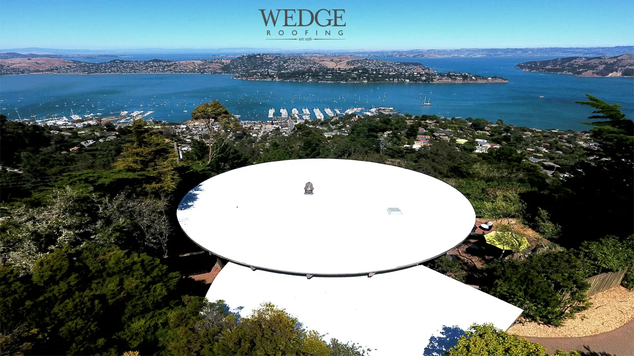 Picture of Overlooking a stunning coastal landscape, Wedge Roofing's expertly crafted circular roof stands as a testament to their dedication to quality outcomes. Recognized for expertise and quality, they deliver exceptional results. Copyright ©2025 Diamond Certified Resource

 - Wedge Roofing
