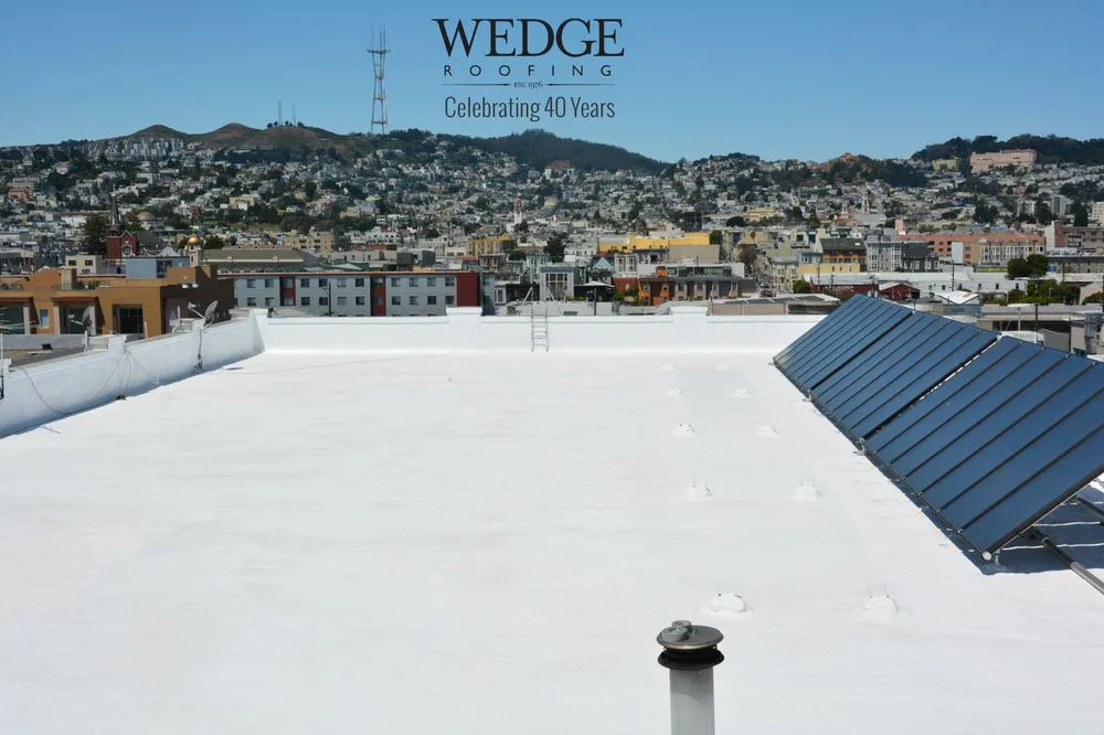 Picture of A pristine white rooftop reflects the sun over a cityscape, showcasing Wedge Roofing's commitment to quality outcomes. Their dedication to expertise and quality is recognized industry-wide. Copyright ©2025 Diamond Certified Resource

 - Wedge Roofing