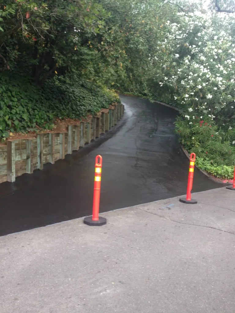 Picture of  Jackson's Paving & Equipment Rentals, Inc. expertly crafts a freshly paved, winding driveway bordered by lush greenery. Known for quality outcomes, the company ensures smooth transitions from concept to completion. Copyright ©2025 Diamond Certified Resource.

 - Jackson's Paving & Equipment Rentals, Inc.