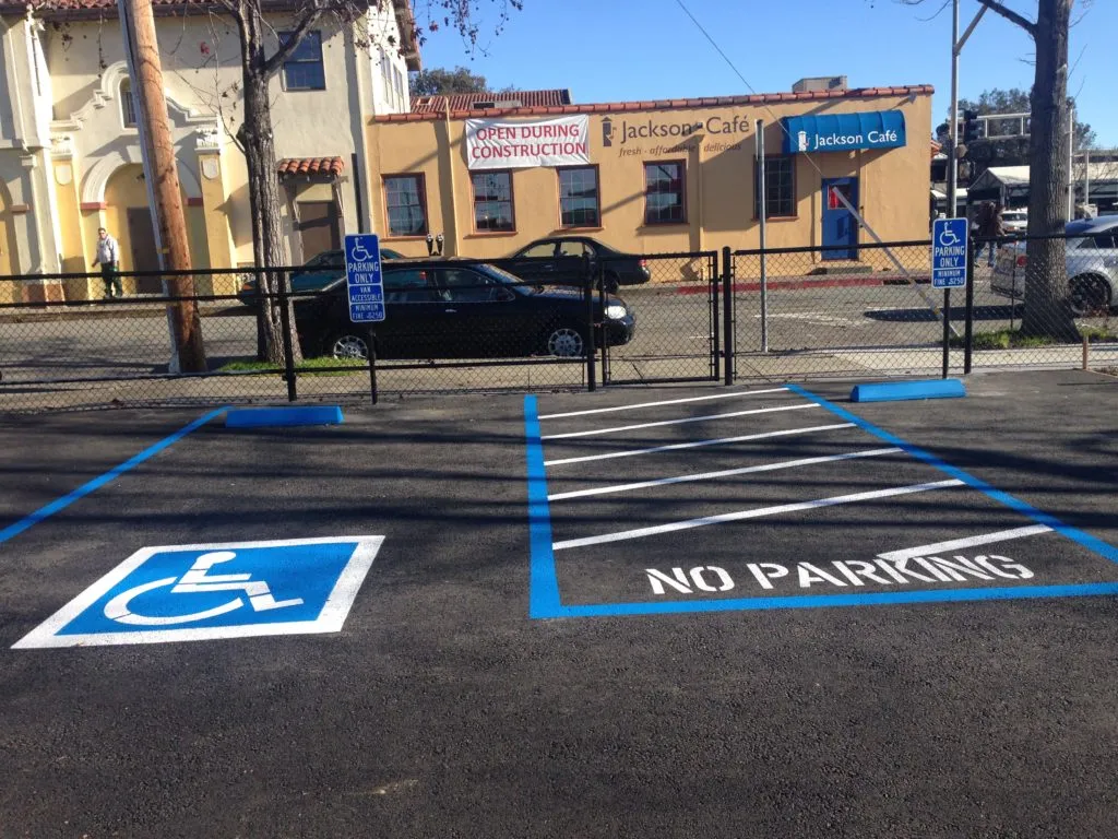 Picture of  A freshly painted accessible parking spot at Jackson's Cafe showcases the meticulous work by Jackson's Paving & Equipment Rentals, Inc., reflecting their focus on quality outcomes. With each project, the company emphasizes high customer satisfaction ratings. Copyright ©2025 Diamond Certified Resource.

 - Jackson's Paving & Equipment Rentals, Inc.
