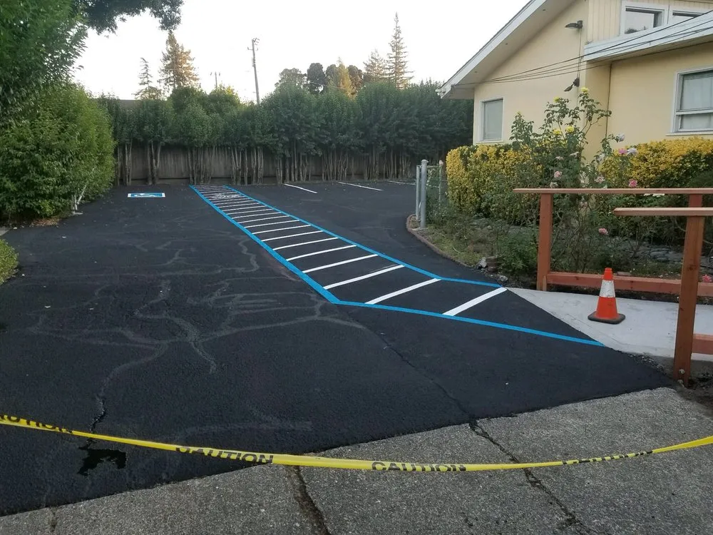 Picture of  A freshly paved parking lot by Jackson's Paving & Equipment Rentals, Inc. showcases precise line markings underlining their focus on quality outcomes. Copyright ©2025 Diamond Certified Resource.

 - Jackson's Paving & Equipment Rentals, Inc.
